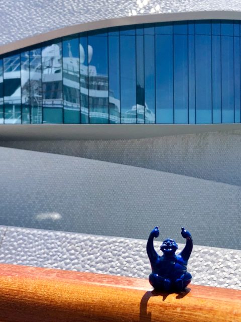 Syd on our balcony in Porto, Portugal ????????. He thought the space-age passenger terminal in the background was far out!